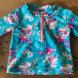 Ruffle Butts toddler long sleeve swim top. Size 12-18 months